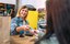 smiling-woman-shop-assistant-taking-credit-card-of-2023-11-17-18-31-15-utc-1024x644.jpg